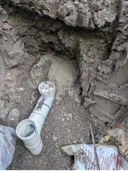 New PVC boundary trap installed and set in concrete by Zebra Plumbing