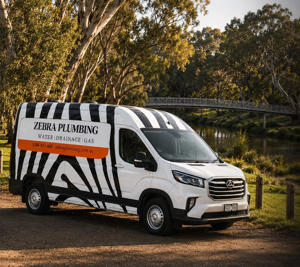 Zebra Plumbing van parked kerbside on a local street