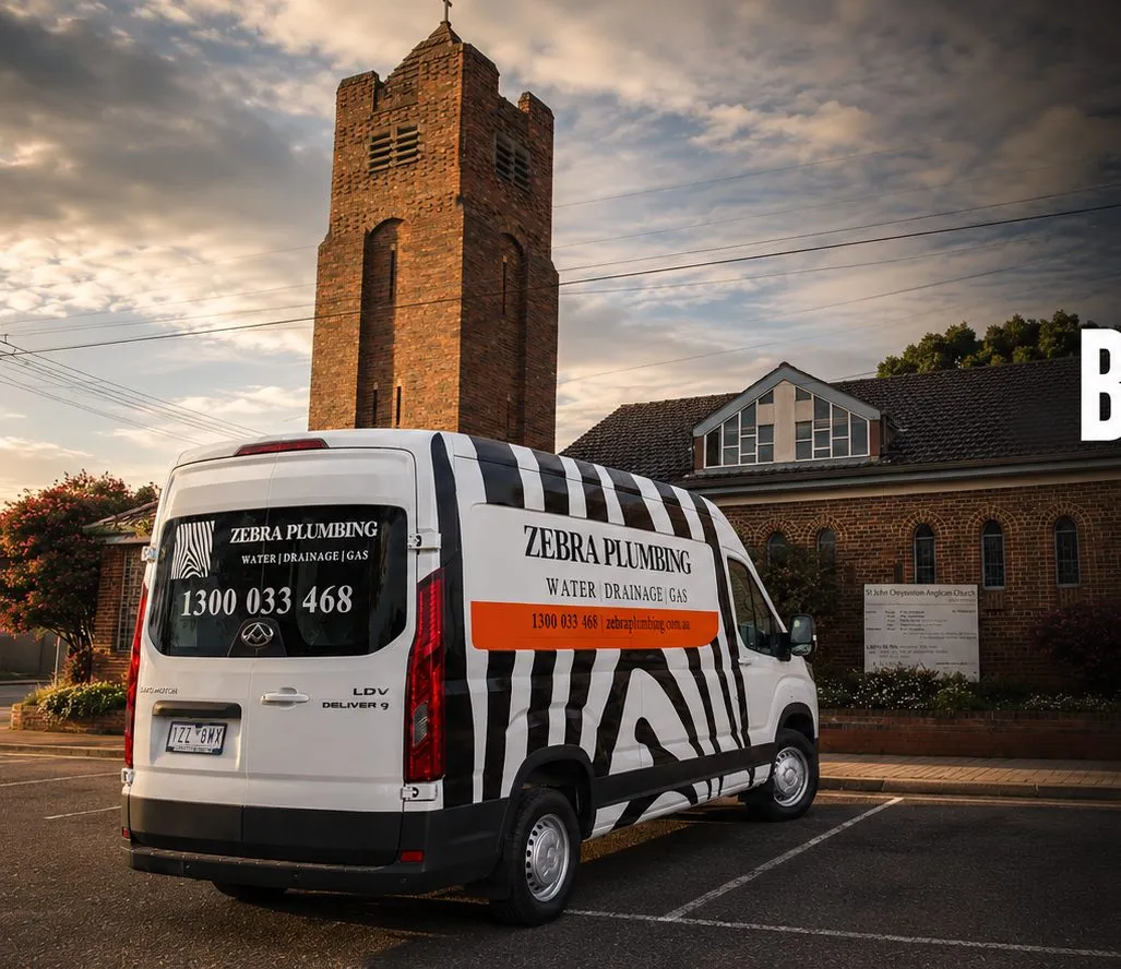 Zebra Plumbing van parked kerbside on a local street