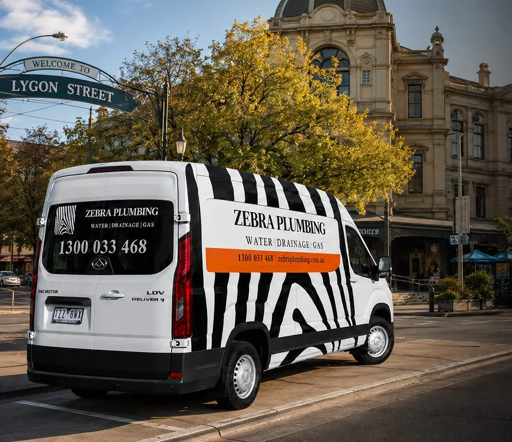 Zebra Plumbing van parked kerbside on a local street