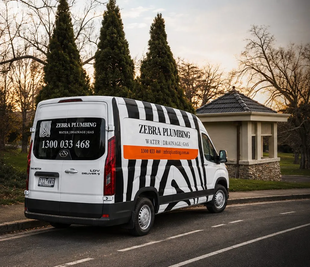 Zebra Plumbing van parked kerbside on a local street
